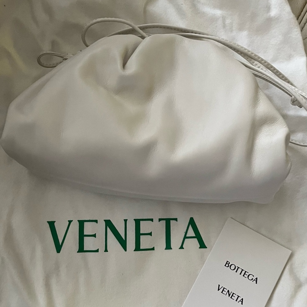 Authentic Bottega Veneta leather mini pouch excellent, like-new in chalk color.